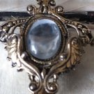 VINTAGE Nice 1980's Goldtone Ornate Framed Clear Faux Glass Cabochon BROOCH.