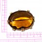 VINTAGE 1950-s Oval Goldtone Large Prong Set Faceted Amber/Brown Glass BROOCH.