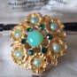 VINTAGE 1970-s Pretty Goldtone Green Glass & Rhinestone Floral BROOCH.