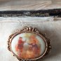 VINTAGE Small Goldtone Framed Glass Printed Fragonard Courting Couple BROOCH.