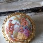 VINTAGE Gold Frame White Glass Fragonard/Courting Couple Printed BROOCH