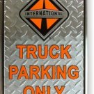 INTERNATIONAL TRUCK DIAMOND EMBOSSED SIGN AD SIGNS