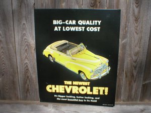 CHEVROLET CONVERTIBLE YELLOW TIN SIGN