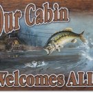 OUR CABIN WELCOMES ALL TIN SIGN
