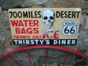 THIRSTY'S DINER EMBOSSED METAL SIGN