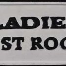 LADIES REST ROOM SIGN CAST IRON PAINTED WHITE BLACK TRIM LADIES REST ROOM SIGN CAST IRON PAINTED WHITE BLACK TRIM