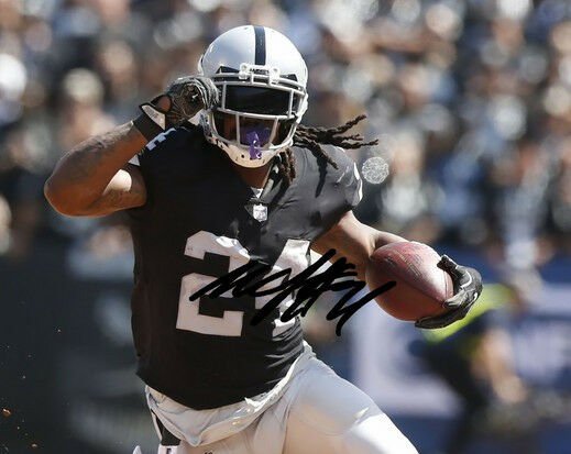 * MARSHAWN LYNCH SIGNED PHOTO 8X10 RP AUTOGRAPHED * OAKLAND RAIDERS