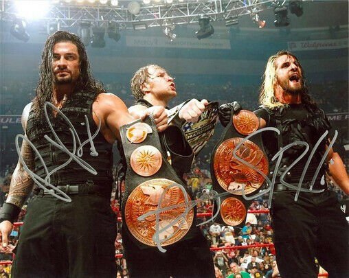 THE SHIELD SIGNED PHOTO 8X10 RP DEAN AMBROSE SETH ROLLINS ROMAN REIGNS WWE WWF