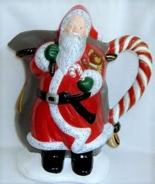 Santa Pitcher Ceramic Hand-Painted Height: 10.75"  Width: 9.50"  Depth: 6.75" Ceramic.