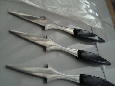 Three corn holders stainless steel with black plastic handles, made in Japan