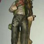 Porcelain Bisque Figurine Old Man With Fiddle Violin Sitting On Tree Stump 7"