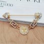 Unique Korean banquet pins rhinestones rod crystals scepter gold brooches