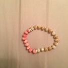 Stretchy pink and tan bracelet