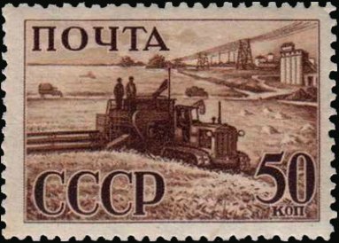 Harvester in the field, vintage postage stamp 1941