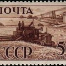 Harvester in the field, vintage postage stamp 1941