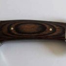 Home knife with wooden handle and handmade decoration