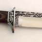 Home knife with wooden handle and handmade decoration