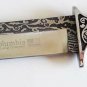 Home knife with wooden handle and handmade decoration