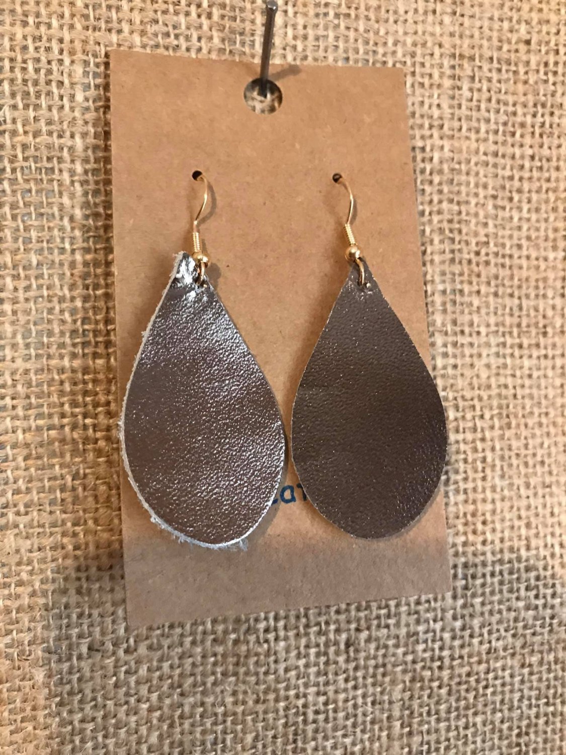 Small black/gold teardrop