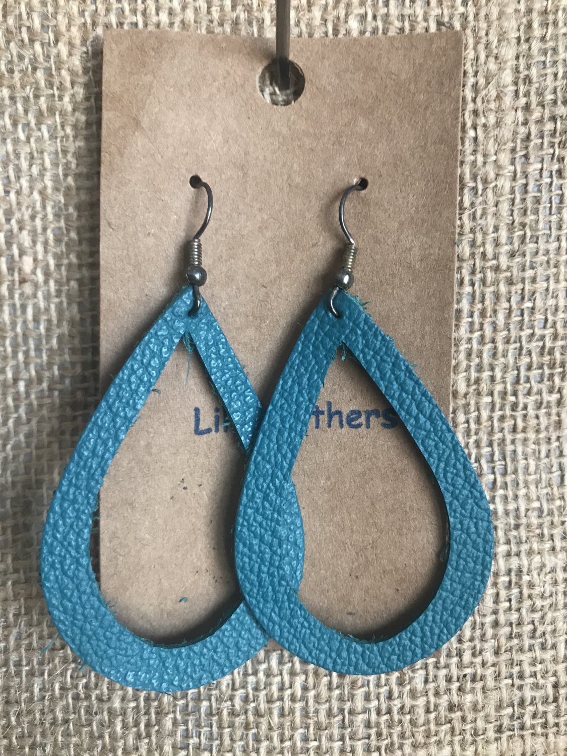 Large cut out teardrop earring
