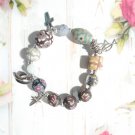 Multicolor Beaded Stretch Bracelet Religious Floral Theme
