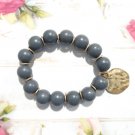 Vintage Gray Beaded Stretch Statement Bracelet with Brass Tone Circle Pendant