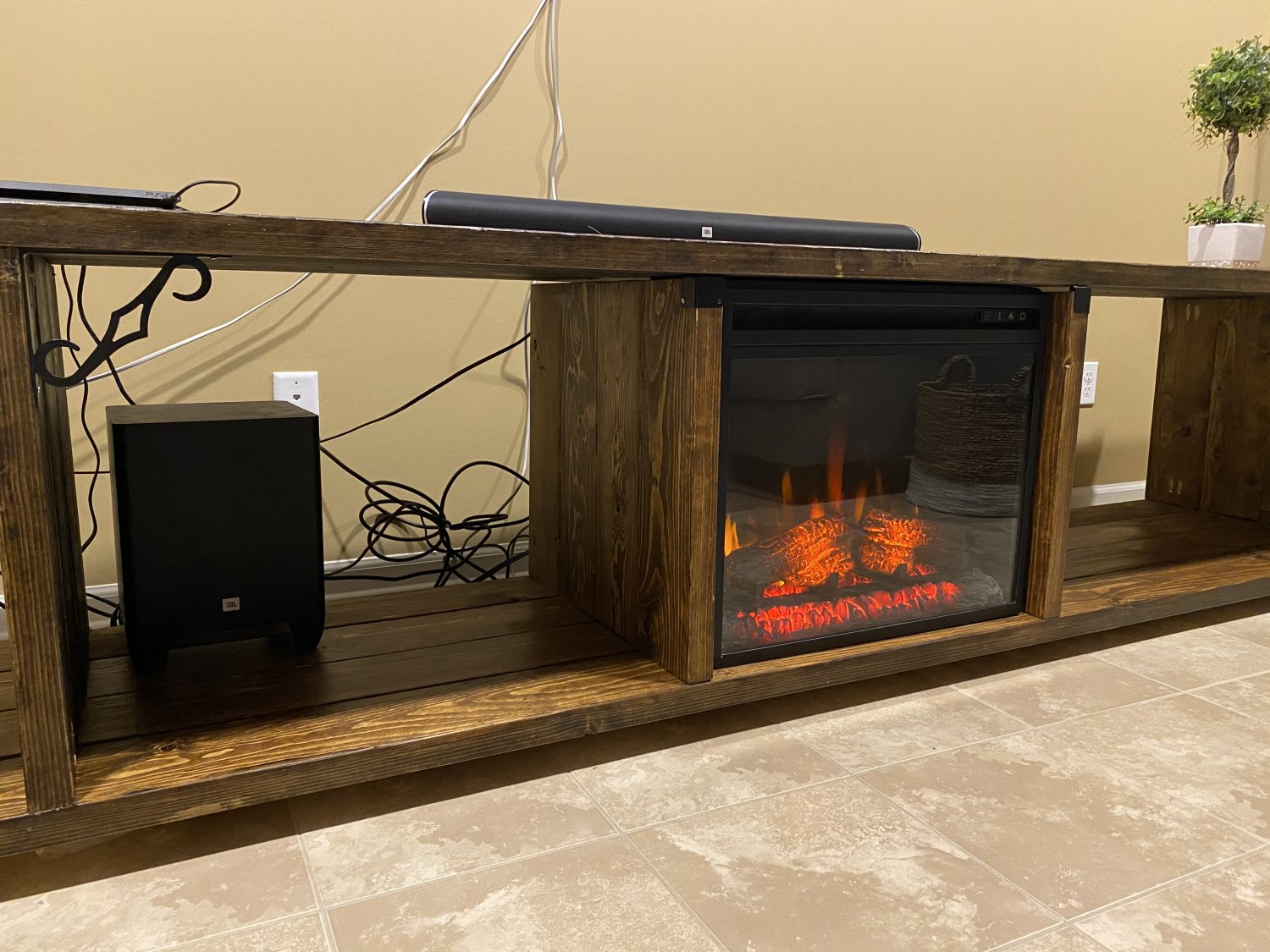 Giant entertainment center with fireplace