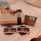 Nintendo nes console with two controllers