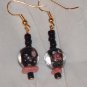 Pretty black flower and glass beaded earrings