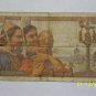 20 & 10 Franc bills.