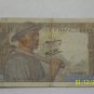 20 & 10 Franc bills.
