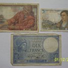 20, 10, and 5 Franc bills.