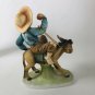 Vintage ceramic boy on donkey figure 8â x 6â