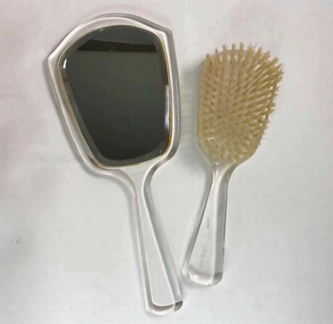 Clear lucite double-sided mirror and brush  Mirror 11&acirc;�� tall  Brush 8.5&acirc;�� tall