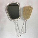 Clear lucite double-sided mirror and brush  Mirror 11” tall  Brush 8.5” tall