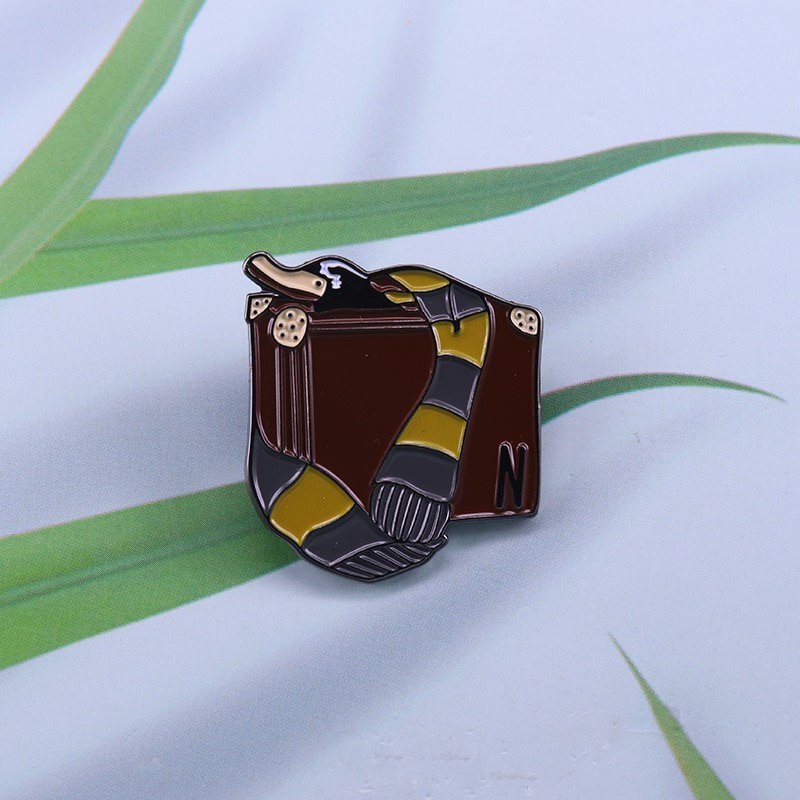 Niffler suitcase pin explore the world with a case full of magical creatures talk dream