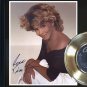 TINA TURNER &acirc;��We Don&acirc;��t Need Another Hero" Framed Reproduction Signed Record Display