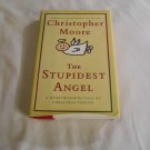 The Stupidest Angel: A Heartwarming Tale of Christmas Terror by Christopher Moore (2004) (R32b4) HC The Stupidest Angel: A Heartwarming Tale of Christmas Terror by Christopher Moore (2004) (R32b4) HC