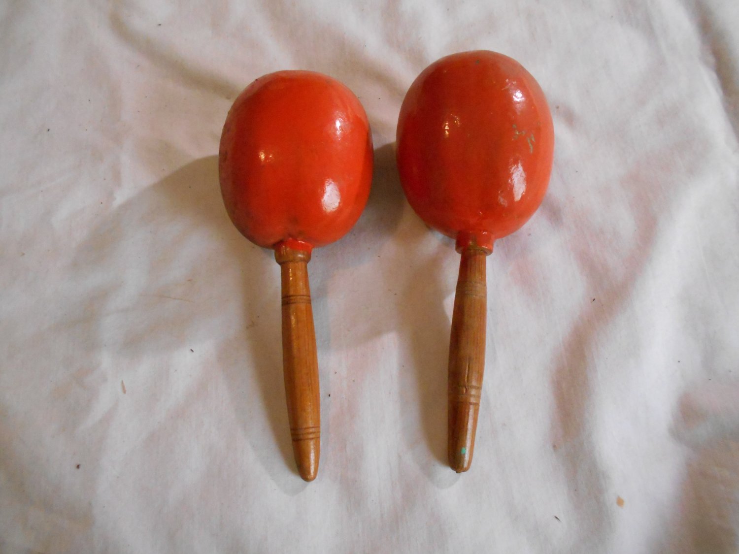 Set Of Vintage Burnt Orange Maracas That Are Marked Bahamas Maraca