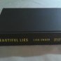 Beautiful Lies by Lisa Unger (2006) () Ridley Jones #1, Doubleday LP HC