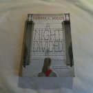 A Night Divided by Jennifer A. Nielsen (2015) (L74d5) Scholastic Inc PB