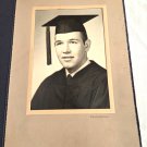 Black and White Photograph Young Man in Cap and Gown Cover Studios ()