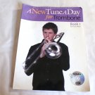 A New Tune a Day - Trombone, Book 1 by Amos Miller (2006) () Boston Music Company PB