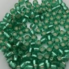 06-38 Toho 6/0 Round Silver-Lined Dark Peridot approx 9.5 grams green