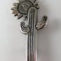 VINTAGE NATIVE AMERICAN SUN AND CACTUS BROOCH