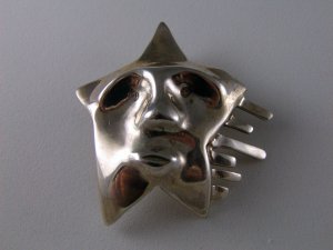VINTAGE STERLING SILVER STAR FACE BROOCH VERY ODD UNUSUAL