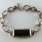STERLING SILVER AND BLACK ONYX BRACELET