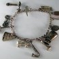 VINTAGE STERLING SILVER CHARM BRACELET AND CHARMS