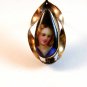 Vintage Hand Painted Porcelain Young Lady or Child in Blue Tear Drop Brooch