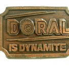1970's - 1980's Doral Is Dynamite Belt Buckle By Hit Line USA 092914